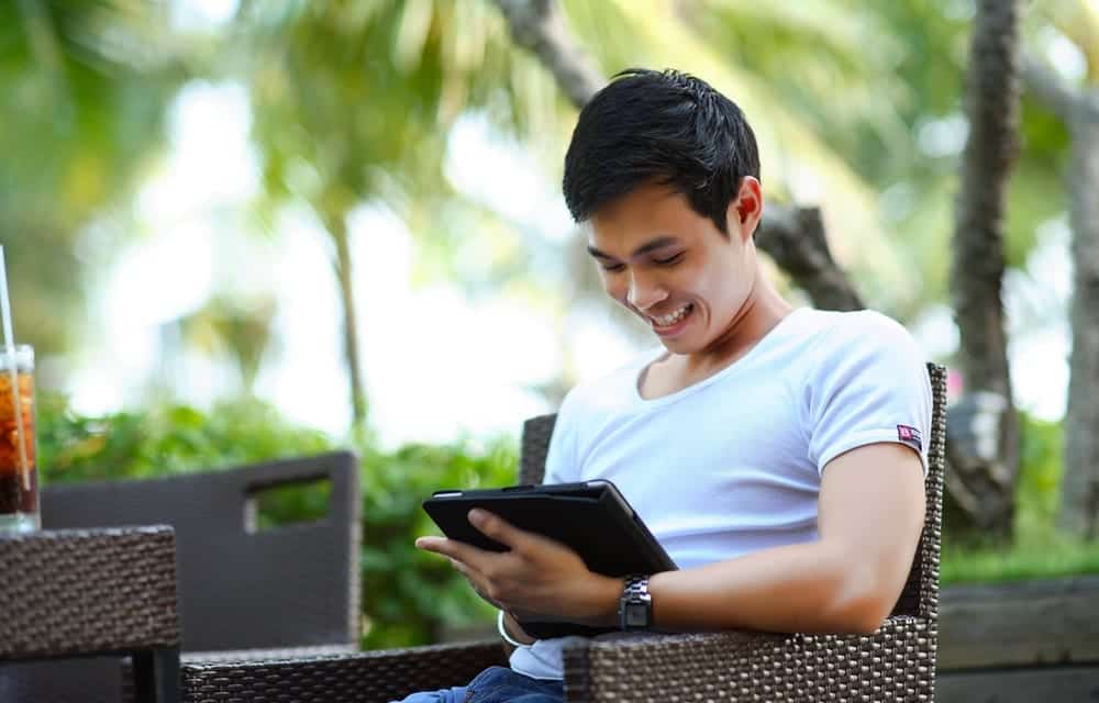 Pisces Man Resting With A Tablet