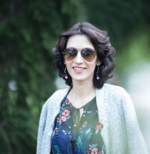 Anna Kovach wearing glasses outdoor